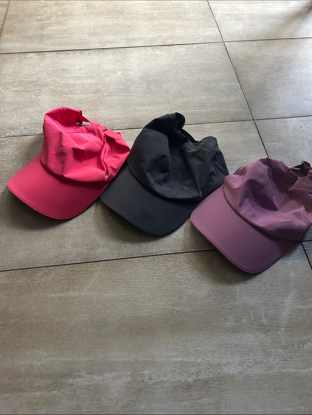 Lululemon ponytail hats. Pink, Black & Purple